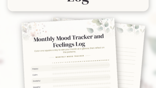 Flat lay of the printed Monthly Mood Tracker and Feelings Log on a cream clipboard with colored pencils, a glass mug of tea and dried eucalyptus on a warm oak desk